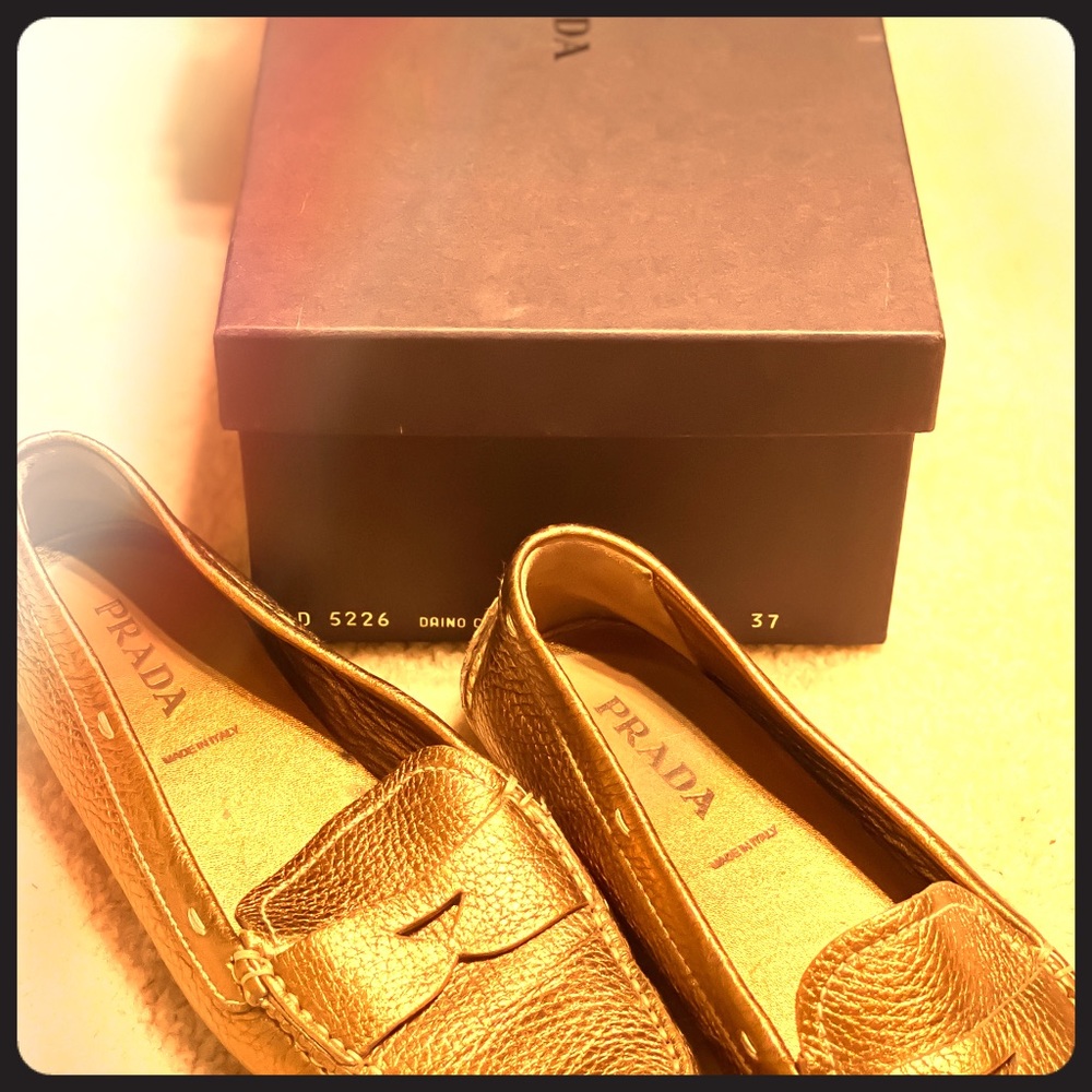 Gently used Prada loafers (European 37, US 7).